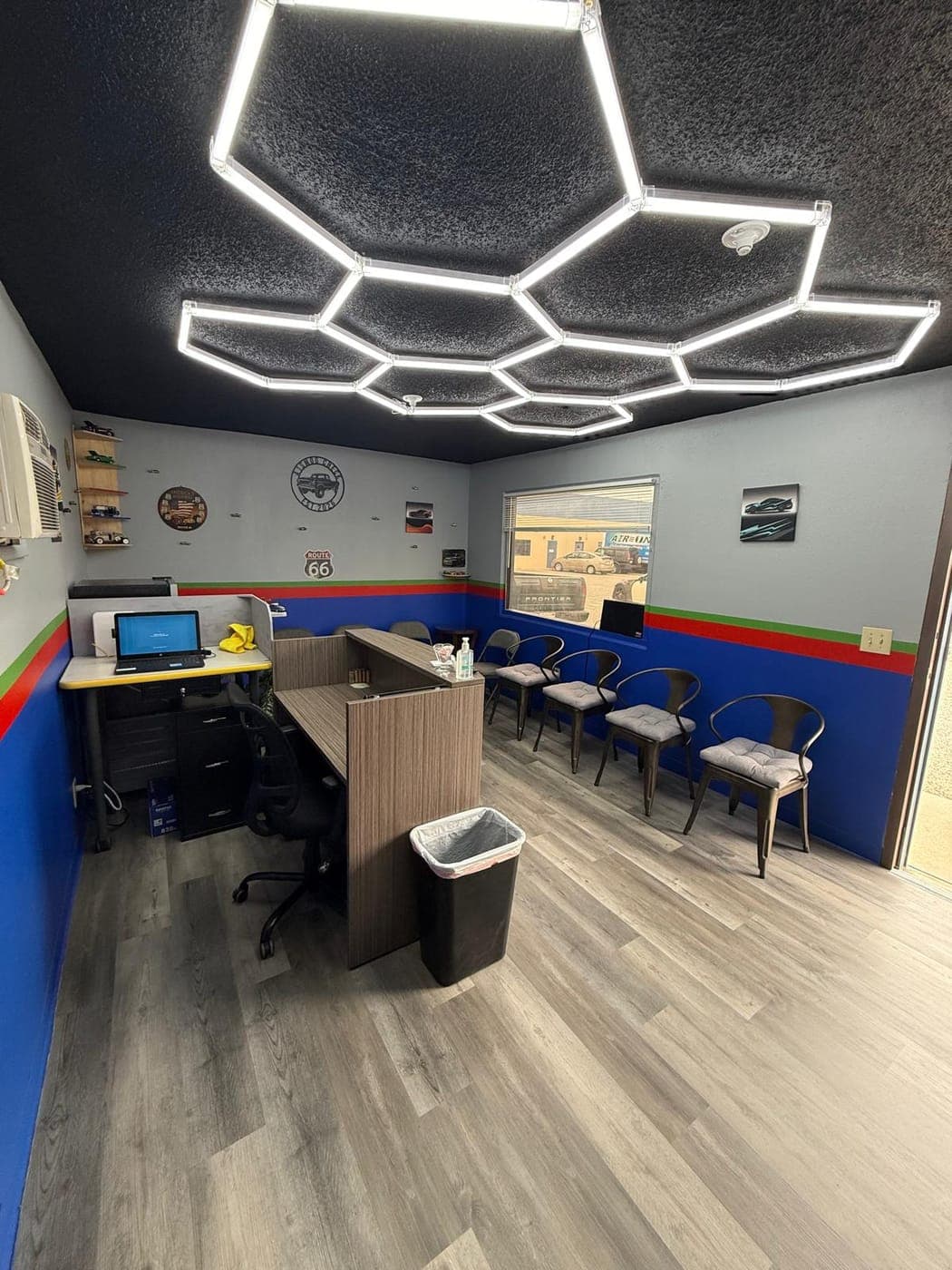 A1 Smog Check waiting room with hexagon LED ceiling lights, front counter and chairs